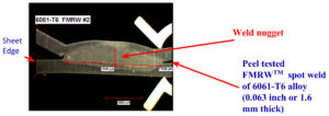 Spot weld at edge of aluminum alloy sheet